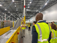 Virginia officials tour Amazon’s delivery station in Virginia Beach, one of multiple facilities built recently in Hampton Roads. Photo courtesy Amazon