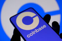 The Coinbase logo on a smartphone screen in this illustration taken November 3, 2025. REUTERS/Dado Ruvic/Illustration/File Photo