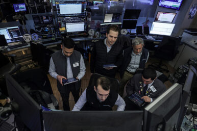 Traders work on the floor at the New York Stock Exchange (NYSE) in New York City, U.S., April 2, 2026. REUTERS/Jeenah Moon