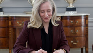 Gov. Abigail Spanberger signs a bill increasing Virginia's minimum wage to $15 per hour by 2028.