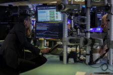 Traders work on the floor at the New York Stock Exchange (NYSE) in New York City, U.S., April 2, 2026. REUTERS/Jeenah Moon/File Photo