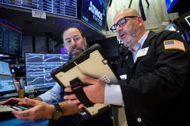 Traders work on the floor at the New York Stock Exchange (NYSE) in New York City, U.S., April 13, 2026. REUTERS/Brendan McDermid