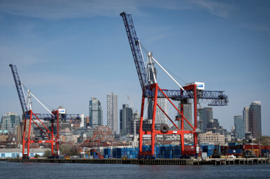 Shipping containers are stacked on a pier at the Red Hook Terminal in Brooklyn, New York City, U.S., April 14, 2026. REUTERS/Brendan McDermid