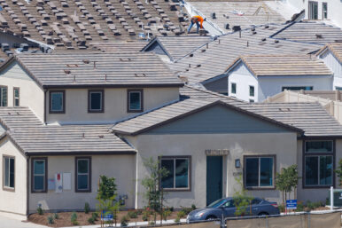 A construction worker works at a Lennar residential housing development called Junipers in San Diego, California, U.S., June 18, 2024. REUTERS/Mike Blake/File Photo