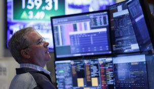 A trader works on the floor at the New York Stock Exchange (NYSE) in New York City, U.S., April 16, 2026. REUTERS/Jeenah Moon