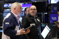 Traders work on the floor at the New York Stock Exchange (NYSE) in New York City, U.S., April 29, 2026. REUTERS/Brendan McDermid