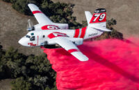 A Cal Fire aircraft drops fire retardant. Photo courtesy Amentum