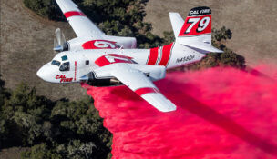 A Cal Fire aircraft drops fire retardant. Photo courtesy Amentum