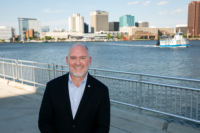 Portsmouth Economic Development Director Brian Donahue stands at the Crawford Bay site the city hopes to redevelop. Photo by Kristen Zeis