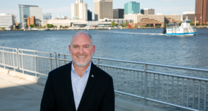 Portsmouth Economic Development Director Brian Donahue stands at the Crawford Bay site the city hopes to redevelop. Photo by Kristen Zeis