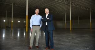 L to R: Mark Heath, president and CEO of Martinsville-Henry County Economic Development Corp., and Henry County Administrator Dale Wagoner show off the Patriot Centre Industrial Park’s new shell building. Photo by Natalee Waters