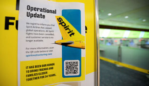 A Spirit Airlines operational update notice at Orlando International Airport after hitting an impasse in talks with some creditors on a $500 million government bailout plan, in Orlando, Florida, U.S., May 2, 2026. REUTERS/Miguel Rodriguez