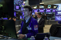A trader works on the floor at the New York Stock Exchange (NYSE) in New York City, U.S., May 1, 2026. REUTERS/Jeenah Moon