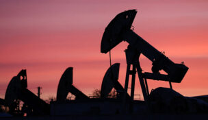 Sunset clouds glow over pump jacks at the Airankol oil field operated by Caspiy Neft in the Atyrau region, Kazakhstan, April 21, 2026. REUTERS/Pavel Mikheyev/File Photo