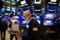 Traders work on the floor at the New York Stock Exchange (NYSE) in New York City, U.S., May 7, 2026. REUTERS/Brendan McDermid