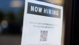 A "now hiring" sign is displayed on a local business after, U.S. employment growth slowed more than expected in July, in Encinitas, California, U.S. August 1, 2025. REUTERS/Mike Blake/File Photo