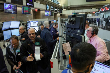 Futures-options traders work on the floor at the New York Stock Exchange's NYSE American (AMEX) in New York City, U.S., April 17, 2026. REUTERS/Brendan McDermid/File Photo