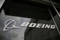 The Boeing logo on the doors to the Boeing factory in Renton, Washington, U.S., April 15, 2026. REUTERS/Genna Martin