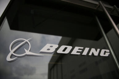 The Boeing logo on the doors to the Boeing factory in Renton, Washington, U.S., April 15, 2026. REUTERS/Genna Martin