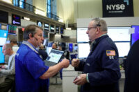 Futures-options traders work on the floor at the New York Stock Exchange's NYSE American (AMEX) in New York City, U.S., May 5, 2026. REUTERS/Brendan McDermid/File Photo