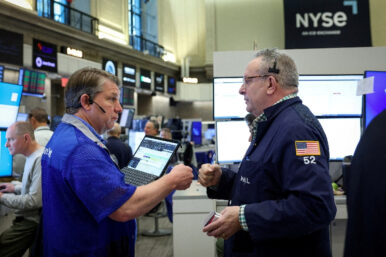 Futures-options traders work on the floor at the New York Stock Exchange's NYSE American (AMEX) in New York City, U.S., May 5, 2026. REUTERS/Brendan McDermid/File Photo