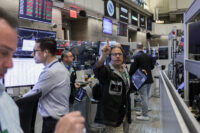 Futures-options traders work on the floor at the New York Stock Exchange's NYSE American (AMEX) in New York City, U.S., May 15, 2026. REUTERS/Jeenah Moon