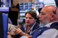 Wall Street rises, Dow hits record high as Middle East hopes lift sentiment