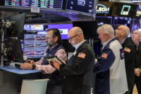 Traders work on the floor at the New York Stock Exchange (NYSE) in New York City, U.S., May 27, 2026. REUTERS/Jeenah Moon