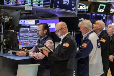 Traders work on the floor at the New York Stock Exchange (NYSE) in New York City, U.S., May 27, 2026. REUTERS/Jeenah Moon