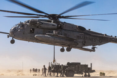 U.S. Marines with Combat Logistics Battalion 8, Combat Logistics Regiment 2, 2nd Marine Logistics Group and Marine Heavy Helicopter Squadron (HMH) 361, Marine Aircraft Group 16, 3rd Marine Air Wing, conduct a helicopter support team operation for the first evaluation of the air transportability of the Medium Range Air Defense Radar during Service Level Training Exercise 4-25 at the Marine Corps Air-Ground Combat Center, Twentynine Palms, California, on July 30, 2025. U.S. Marine Corps photo by Cpl. Judith Ann Lazaro