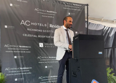 Neil Amin speaks at a groundbreaking celebration Monday. Photo courtesy Shamin Hotels