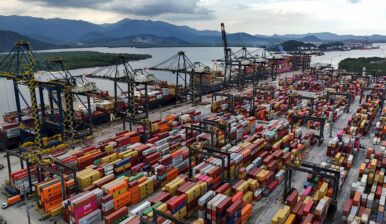 A drone view shows ships and containers at the Port of Santos, in Santos, Brazil April 3, 2025. REUTERS/Amanda Perobelli
