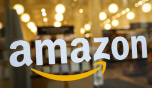The logo of Amazon is seen on the door of an Amazon Books retail store in New York City, U.S., February 14, 2019. REUTERS/Brendan McDermid