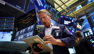Traders work on the floor at the New York Stock Exchange (NYSE) in New York City, U.S., June 8, 2026. REUTERS/Brendan McDermid