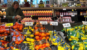 People shop for groceries at a store in Port Washington, New York, U.S., November 19, 2025. REUTERS/Shannon Stapleton