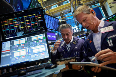 Traders work on the floor at the New York Stock Exchange (NYSE) in New York City, U.S., June 3, 2026. REUTERS/Brendan McDermid/File Photo