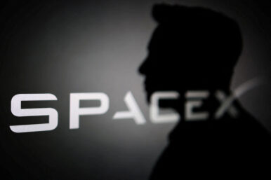 The silhouette of Elon Musk and SpaceX logo are seen in this illustration taken June 11, 2026. REUTERS/Dado Ruvic/Illustration