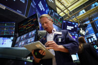 Traders work on the floor at the New York Stock Exchange (NYSE) in New York City, U.S., June 8, 2026. REUTERS/Brendan McDermid