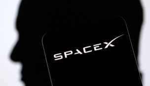 SpaceX logo and Elon Musk silhouette are seen in this illustration taken, December 19, 2022. REUTERS/Dado Ruvic/Illustration