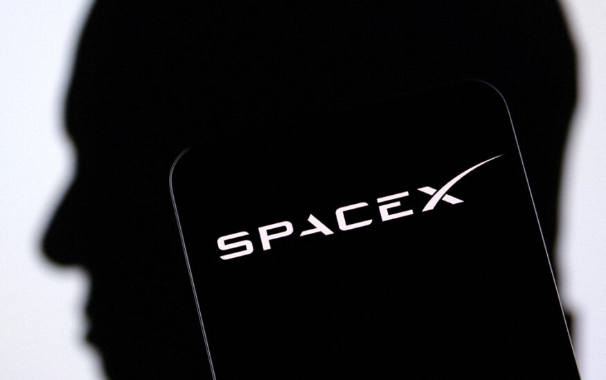 SpaceX logo and Elon Musk silhouette are seen in this illustration taken, December 19, 2022. REUTERS/Dado Ruvic/Illustration