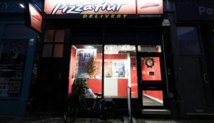 A view of a Pizza Hut store, in London, Britain, December 30, 2024. REUTERS/Mina Kim/File Photo