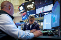 Traders work on the floor at the New York Stock Exchange (NYSE) in New York City, U.S., June 3, 2026. REUTERS/Brendan McDermid