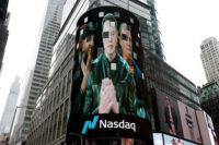 A live feed shows SpaceX CEO Elon Musk on the day of SpaceX's initial public offering (IPO) at the Nasdaq MarketSite, in New York City, U.S., June 12, 2026. REUTERS/Jeenah Moon/File Photo