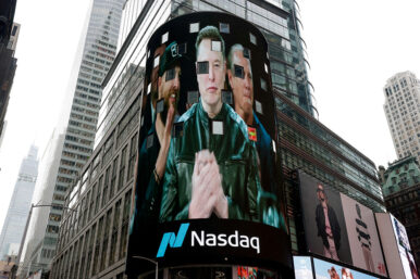 A live feed shows SpaceX CEO Elon Musk on the day of SpaceX's initial public offering (IPO) at the Nasdaq MarketSite, in New York City, U.S., June 12, 2026. REUTERS/Jeenah Moon/File Photo