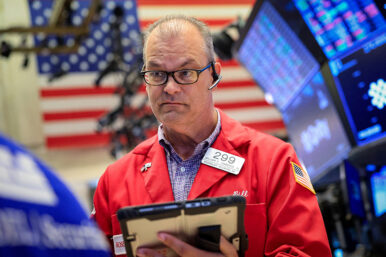 Traders work on the floor at the New York Stock Exchange (NYSE) in New York City, U.S., June 22, 2026. REUTERS/Brendan McDermid TPX IMAGES OF THE DAY