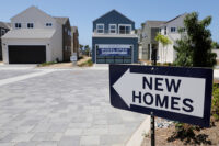 Newly constructed single family homes are shown for sale in Encinitas, California, U.S., July 31, 2019. REUTERS/Mike Blake/File Photo