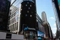 The Nasdaq logo is displayed on a screen at the Nasdaq Market site in Times Square in New York City, U.S., April 17, 2026. REUTERS/Brendan McDermid