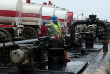 Men work during the unloading of oil from trucks arriving from Iraq at the Baniyas oil terminal, in Baniyas, Syria, May 14, 2026. REUTERS/Mahmoud Hassano/File Photo