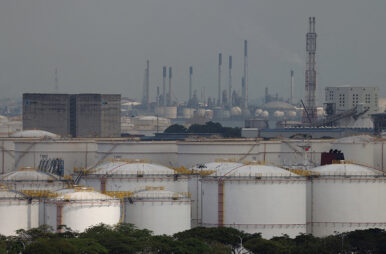 Storage tanks and oil refineries in Jurong Island, Singapore, March 24, 2026. REUTERS/Edgar Su/File Photo