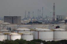 Storage tanks and oil refineries in Jurong Island, Singapore, March 24, 2026. REUTERS/Edgar Su/File Photo